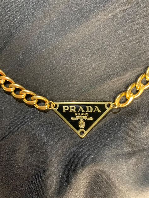 gold Prada necklace dupe